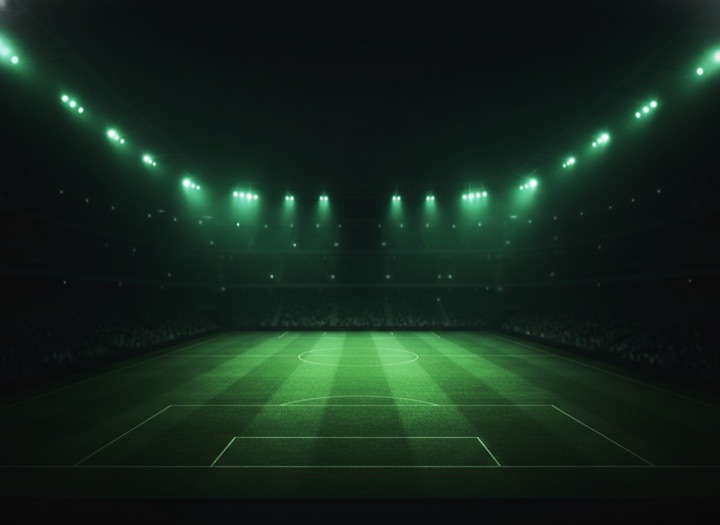 A floodlit arena lit green